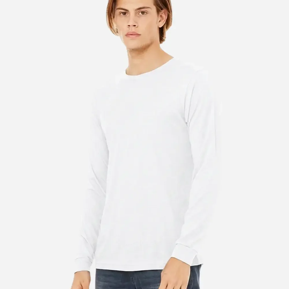 Man wearing a plain white long-sleeved t-shirt and jeans