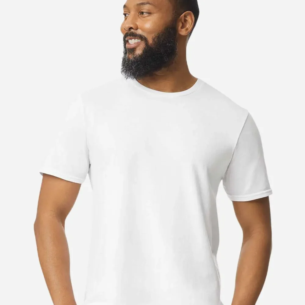 Man wearing a plain white t-shirt and jeans, looking to the side