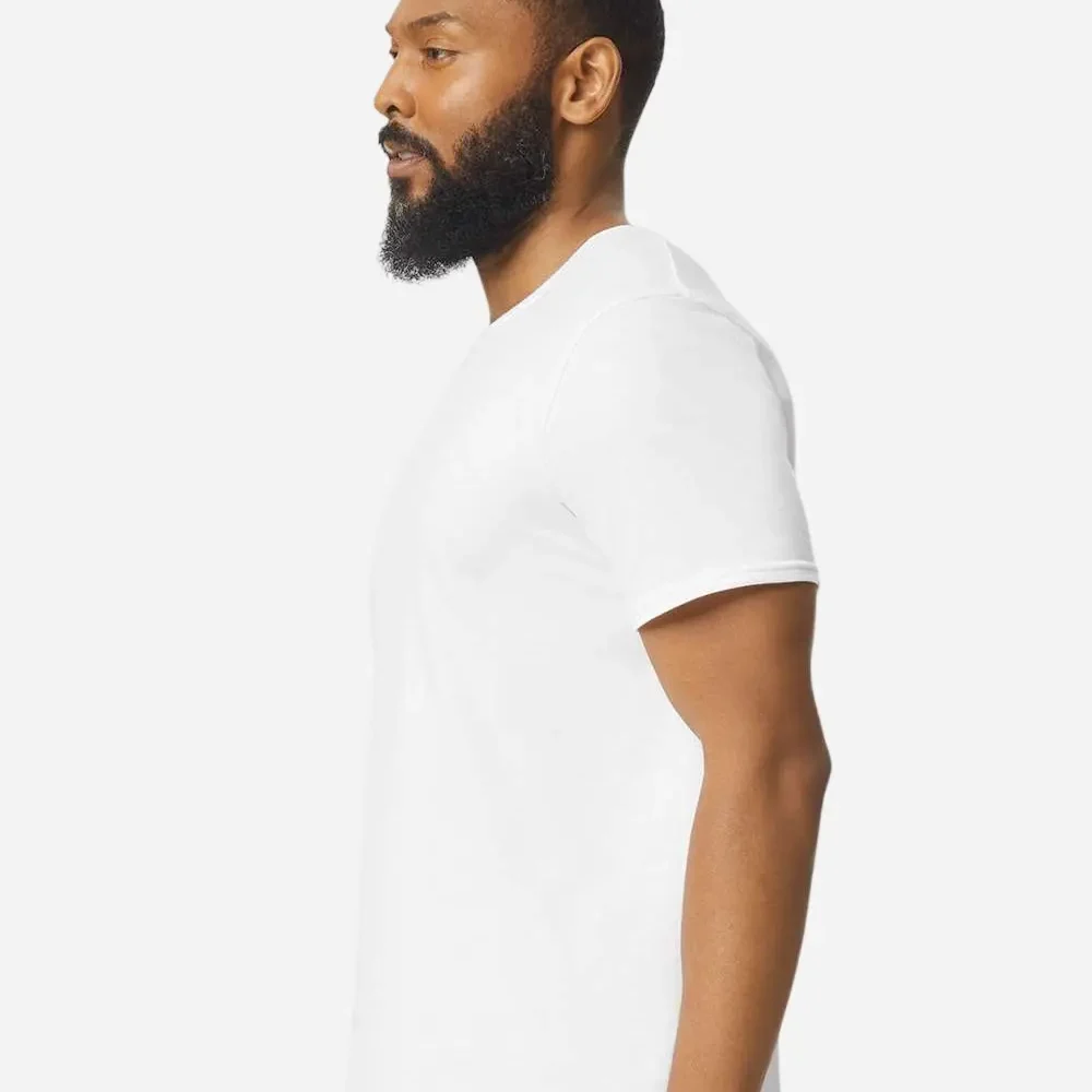 Man wearing a white t-shirt and jeans, profile view