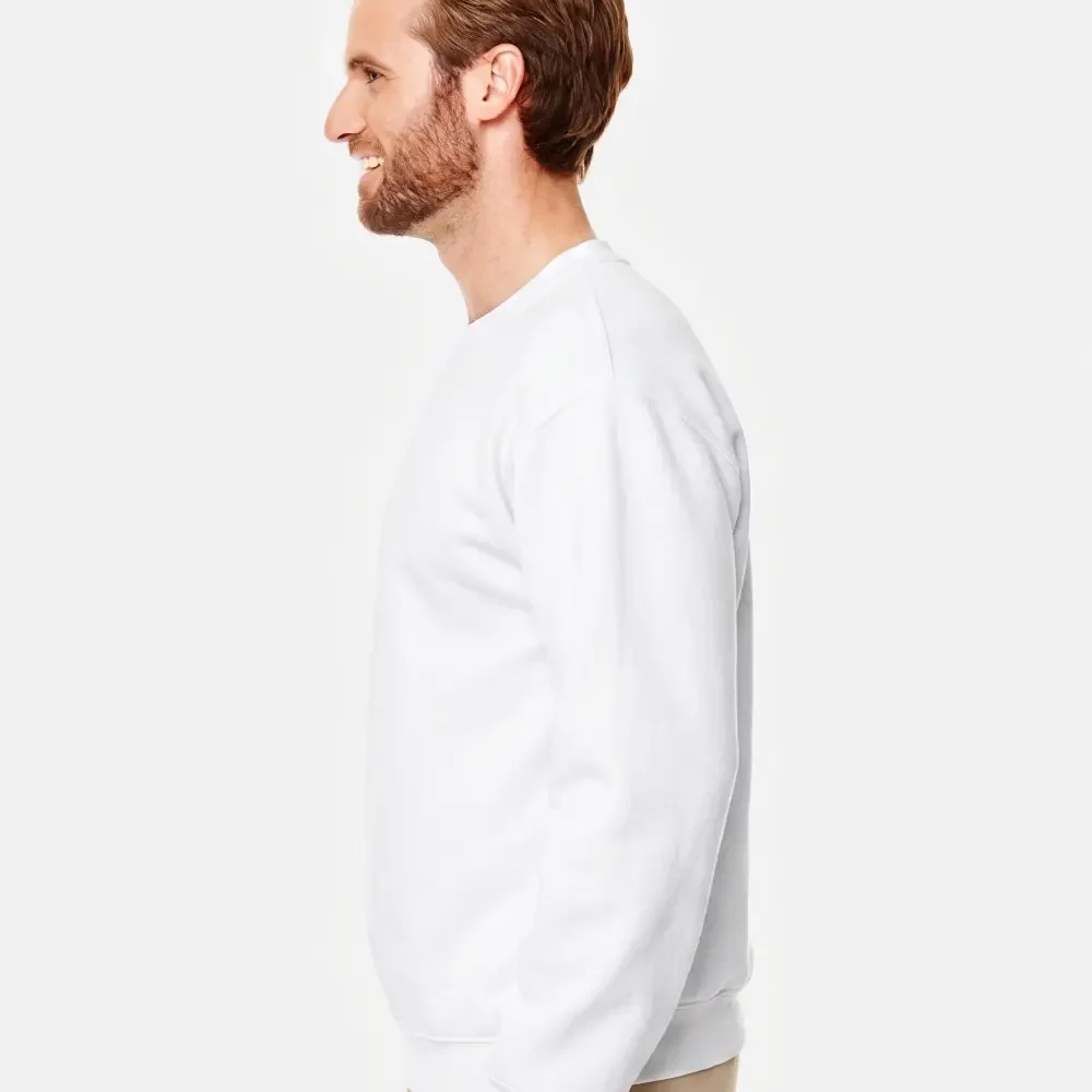 Man in a white sweatshirt and beige pants, profile view