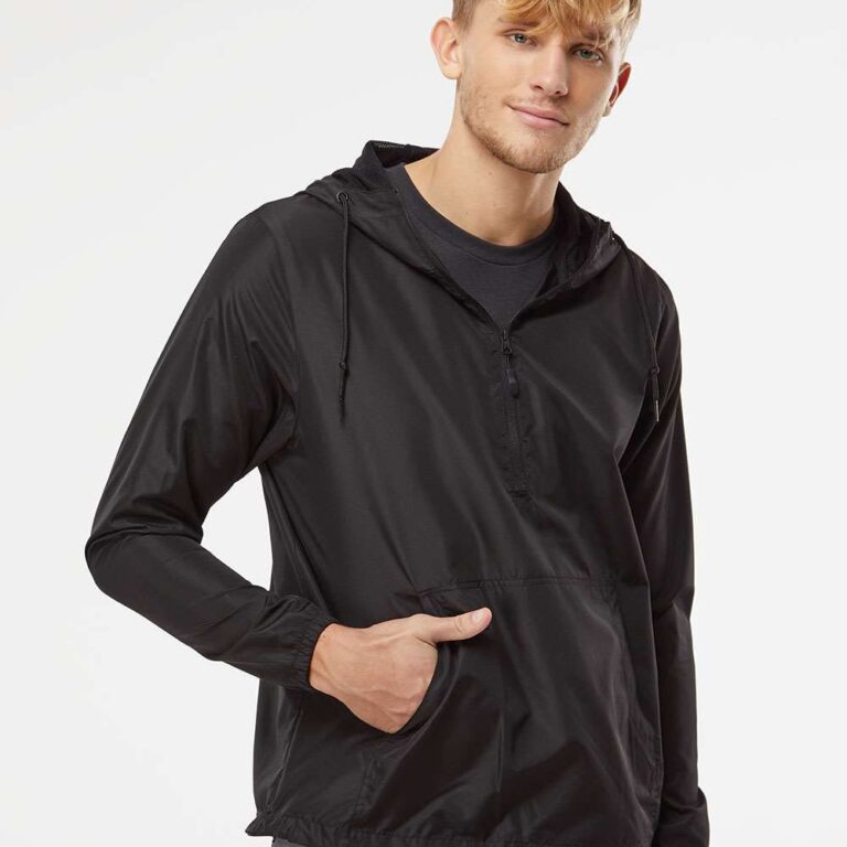 Man in black hooded anorak jacket with quarter zip and front pocket