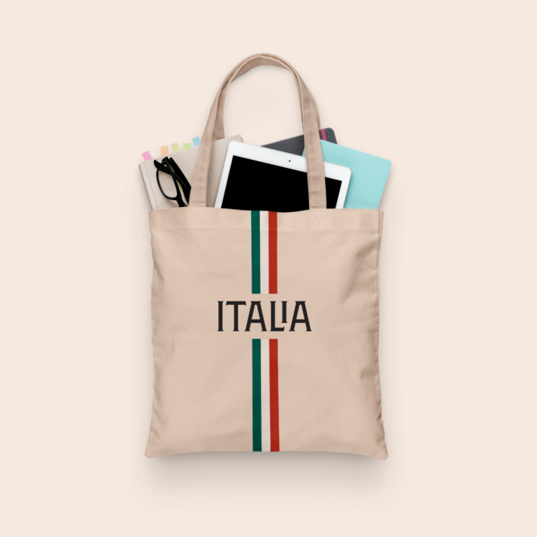 Italia tote bag with books, glasses, and tablet