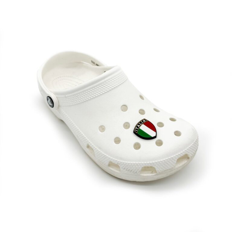 White Croc shoe with an Italia crest charm on a white background