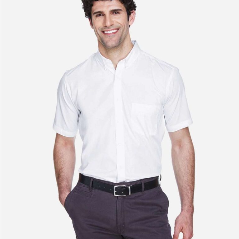 Man in white short sleeve button down shirt and grey pants with black belt