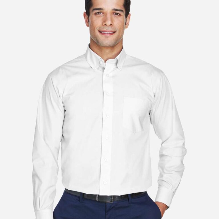 Man wearing a white button-down dress shirt and navy trousers.