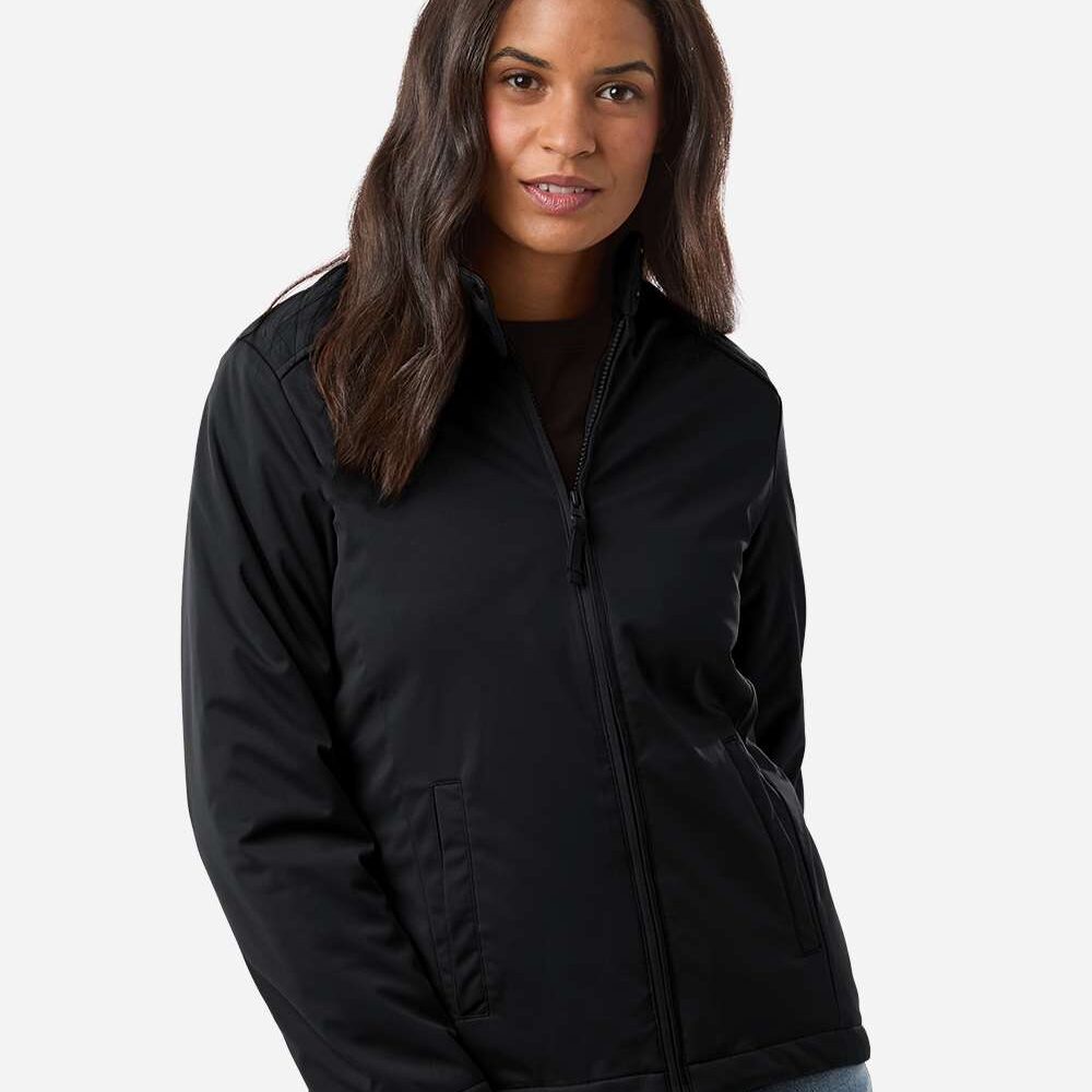 Woman wearing a black zip-up jacket and blue jeans