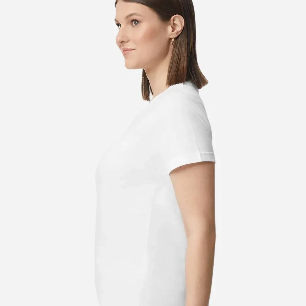 Woman in white t-shirt and dark blue jeans, profile view