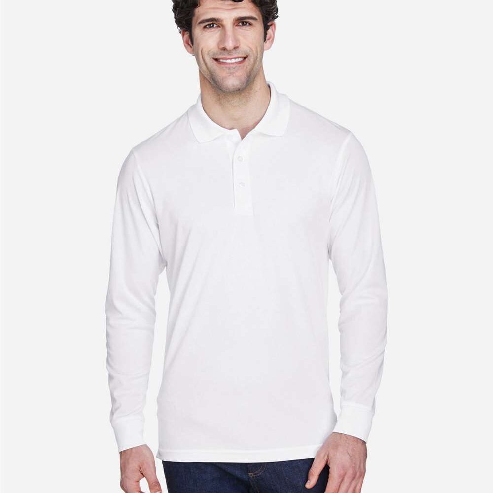 Man wearing a white long sleeve polo shirt and blue jeans