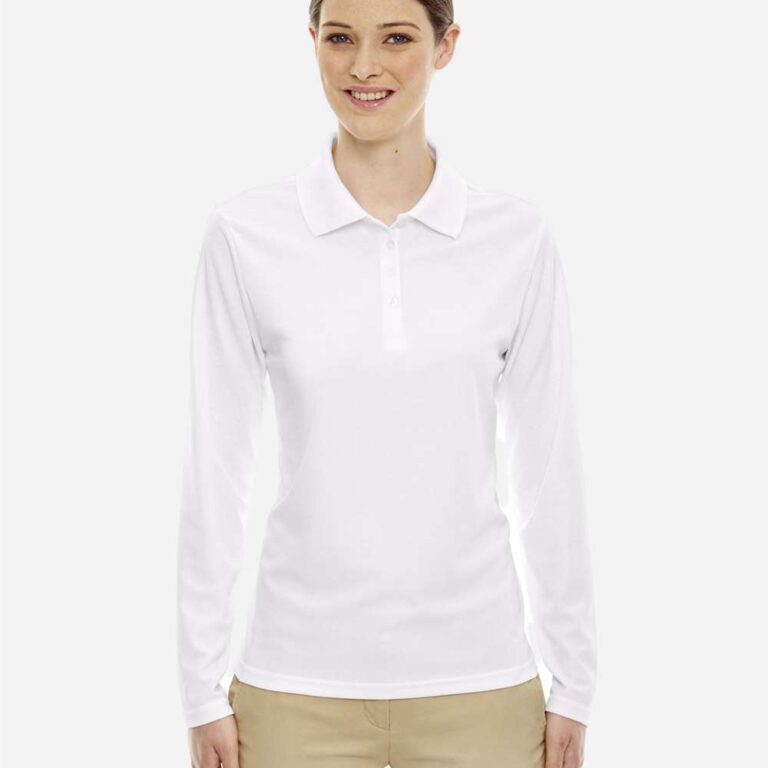 Woman wearing a white long sleeve polo shirt and tan capri pants