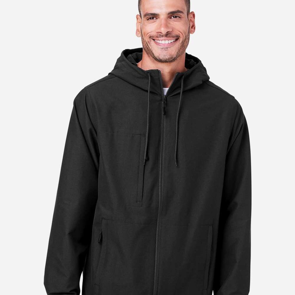 Man wearing a black hooded jacket with zip closure and elastic cuffs
