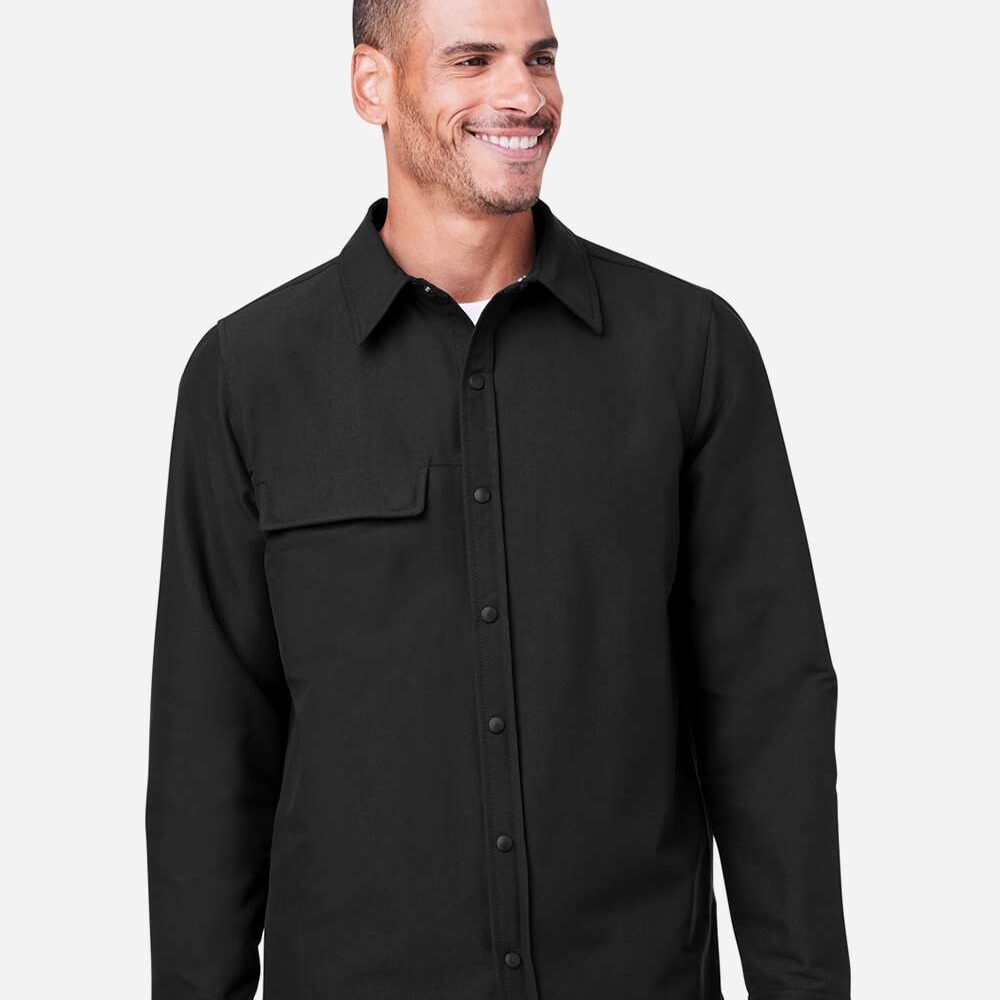Man wearing a black button up work shirt with chest pocket.