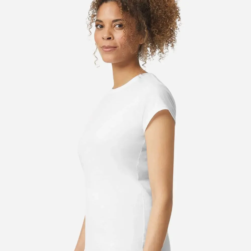 Woman in white t-shirt and blue jeans viewed from side.