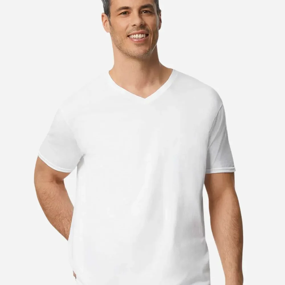 Man in white V-neck t-shirt with hand in pocket
