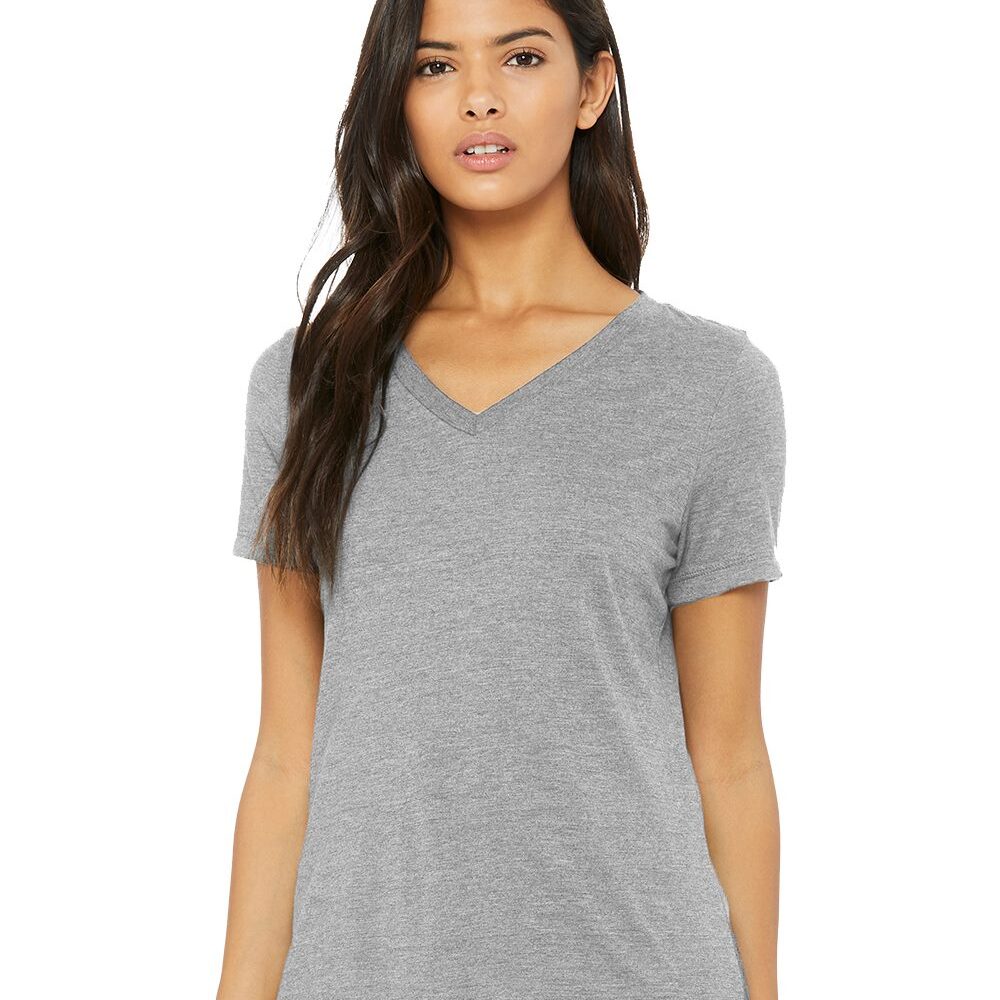 Woman in heather grey v-neck t-shirt and blue jeans