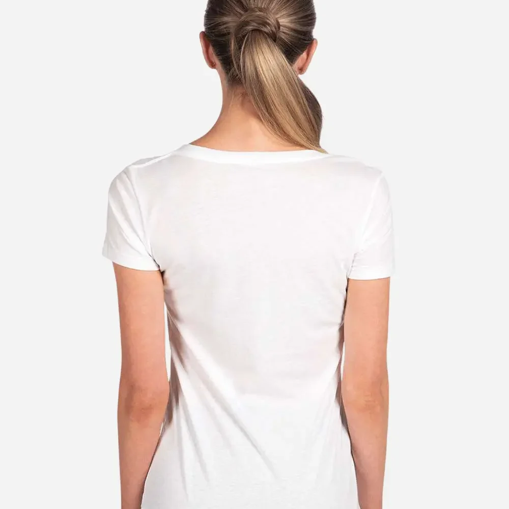 Woman from behind wearing a plain white v-neck t-shirt with hair in a ponytail
