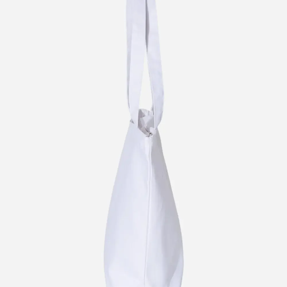 White canvas tote bag with white straps