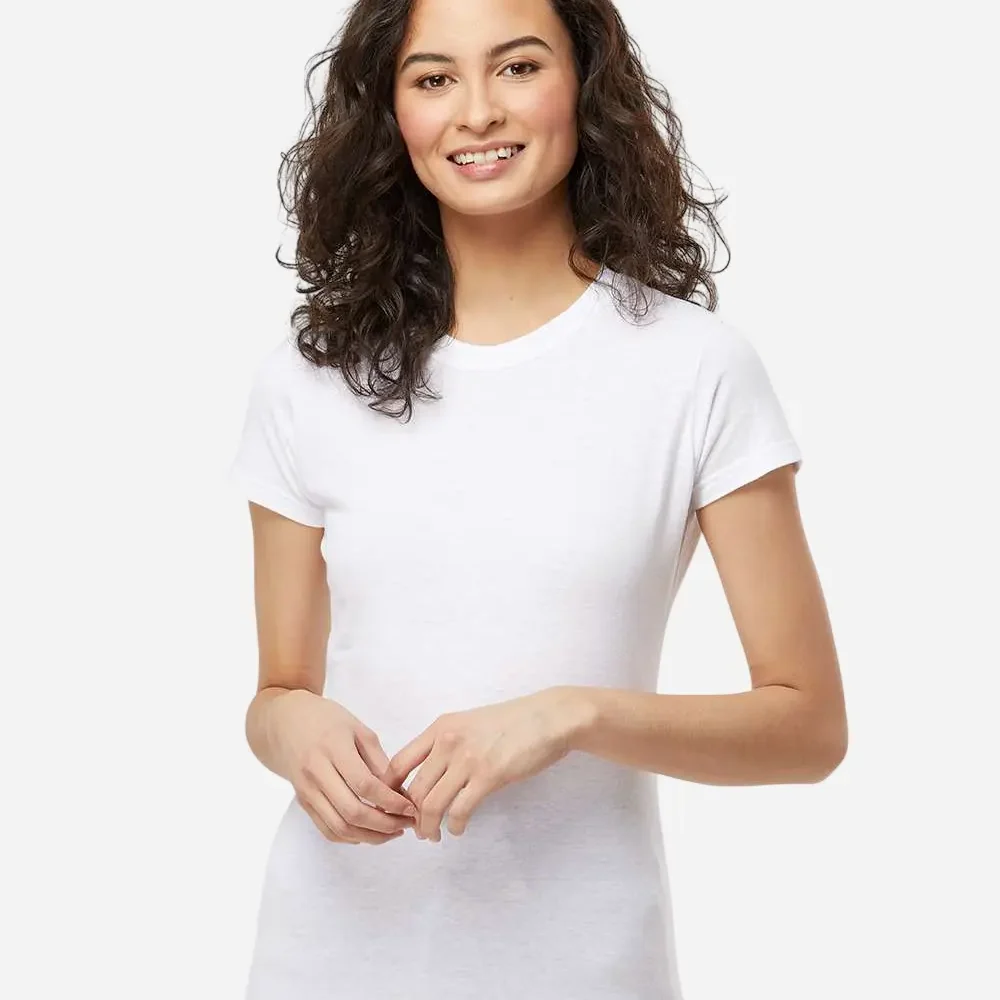 Woman in a white short-sleeve t-shirt smiling against a white background